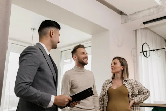 Property Manager talking to two tenants